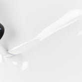 A swatch of the color WHITE ON WHITE.