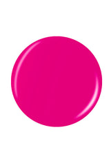 Closeup of a glossy neon pink circle sample nail polish swatch drop isolated in white color background