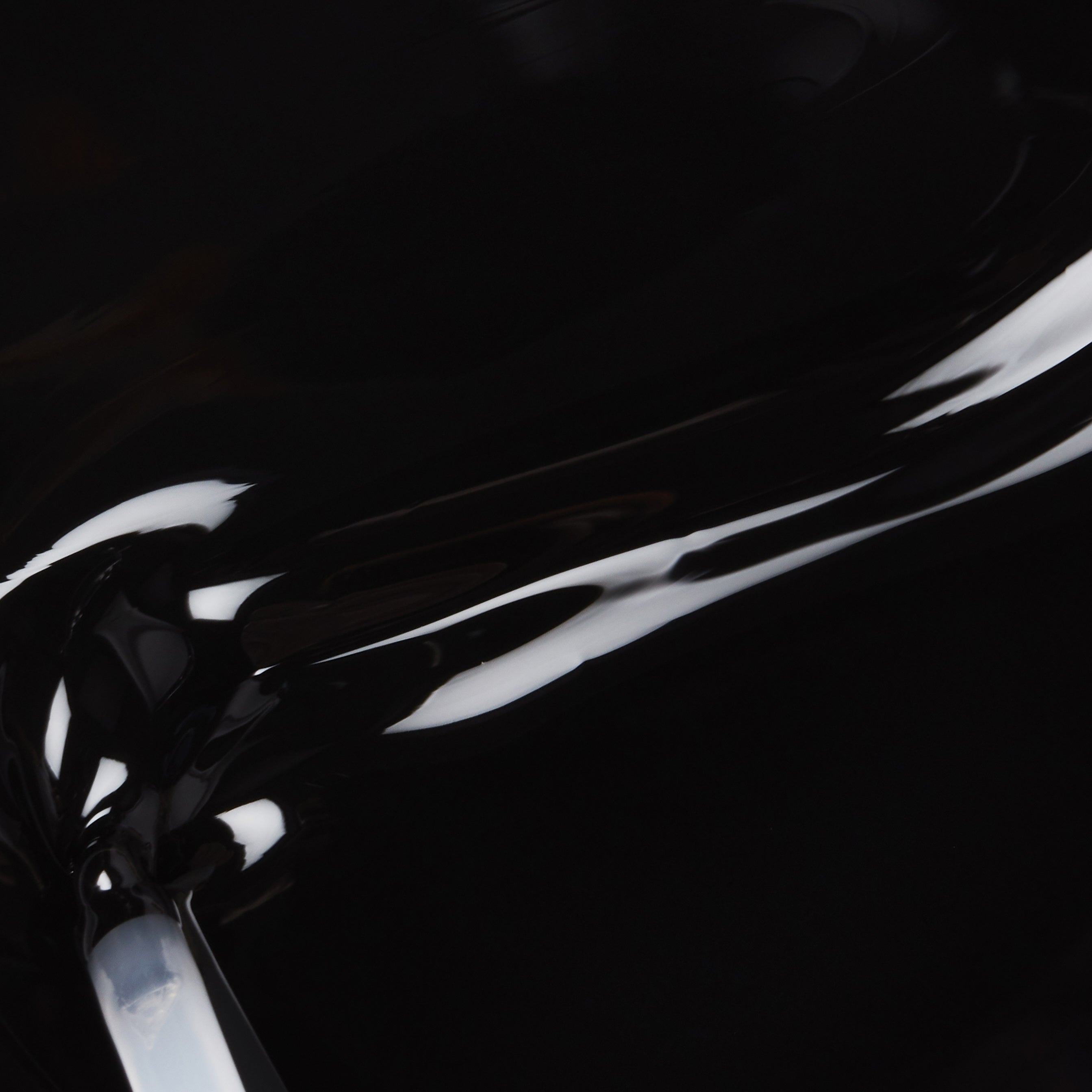 A swatch of the color LIQUID LEATHER. 