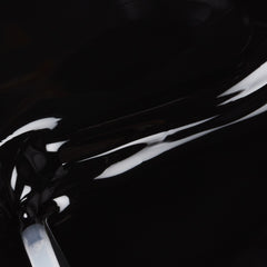 A swatch of the color LIQUID LEATHER. 