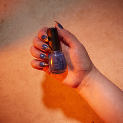 Hand model image of shade Sky of Lavender, a holographic silver metallic . 

