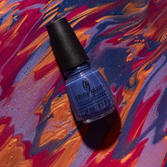 Stylized image of shade Night Dunes, a gold brown with gold shimmer. 
