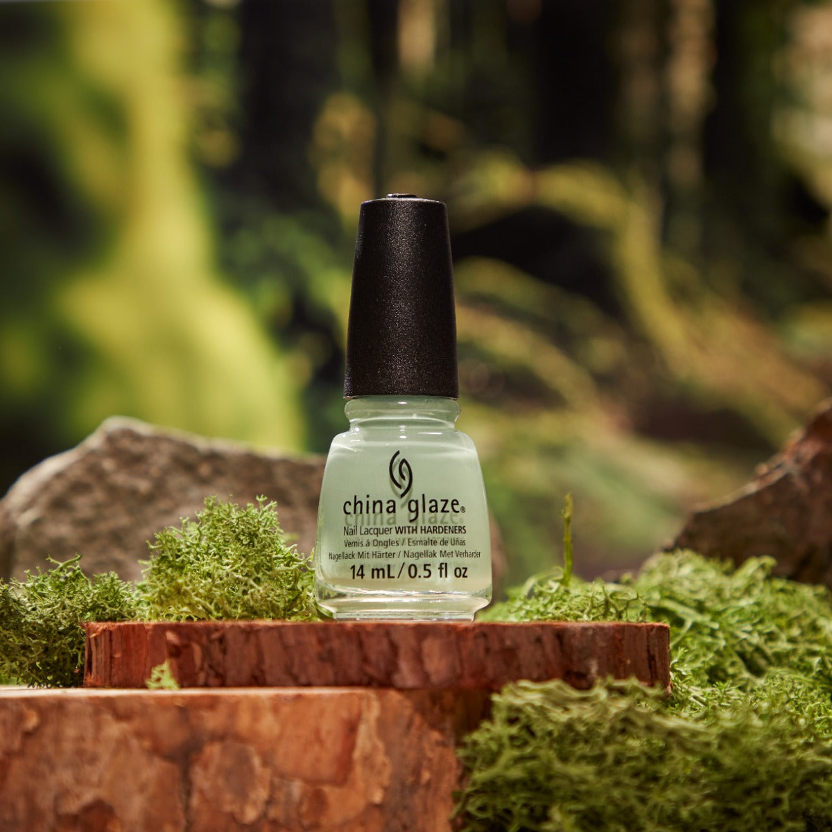 Stylized image with China Glaze Nail Lacquer, Mystic Garden bottle 