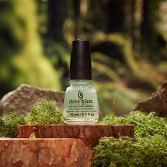 Stylized image with China Glaze Nail Lacquer, Mystic Garden bottle 